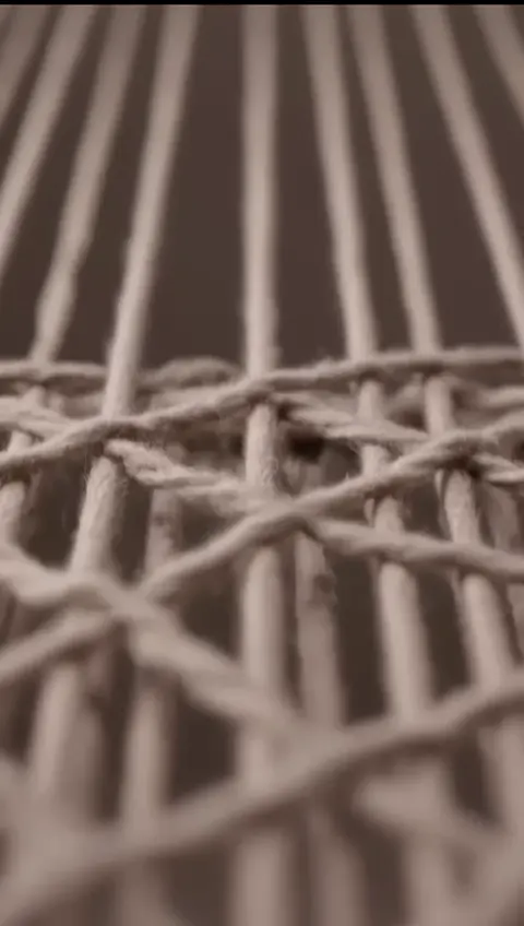 Macro de un tejido en tonos neutros